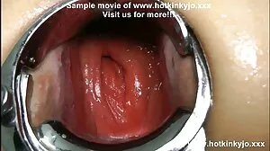 Pissing lesbo rubs clit